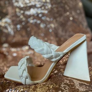 4”, Square-toed two strap braided chunky heel.